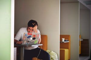 man frustrated terrible web design